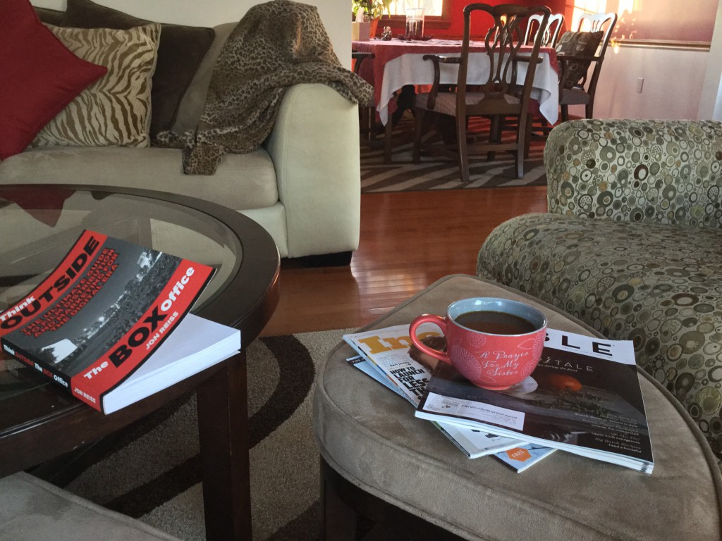 Image of coffee table with books and mocha