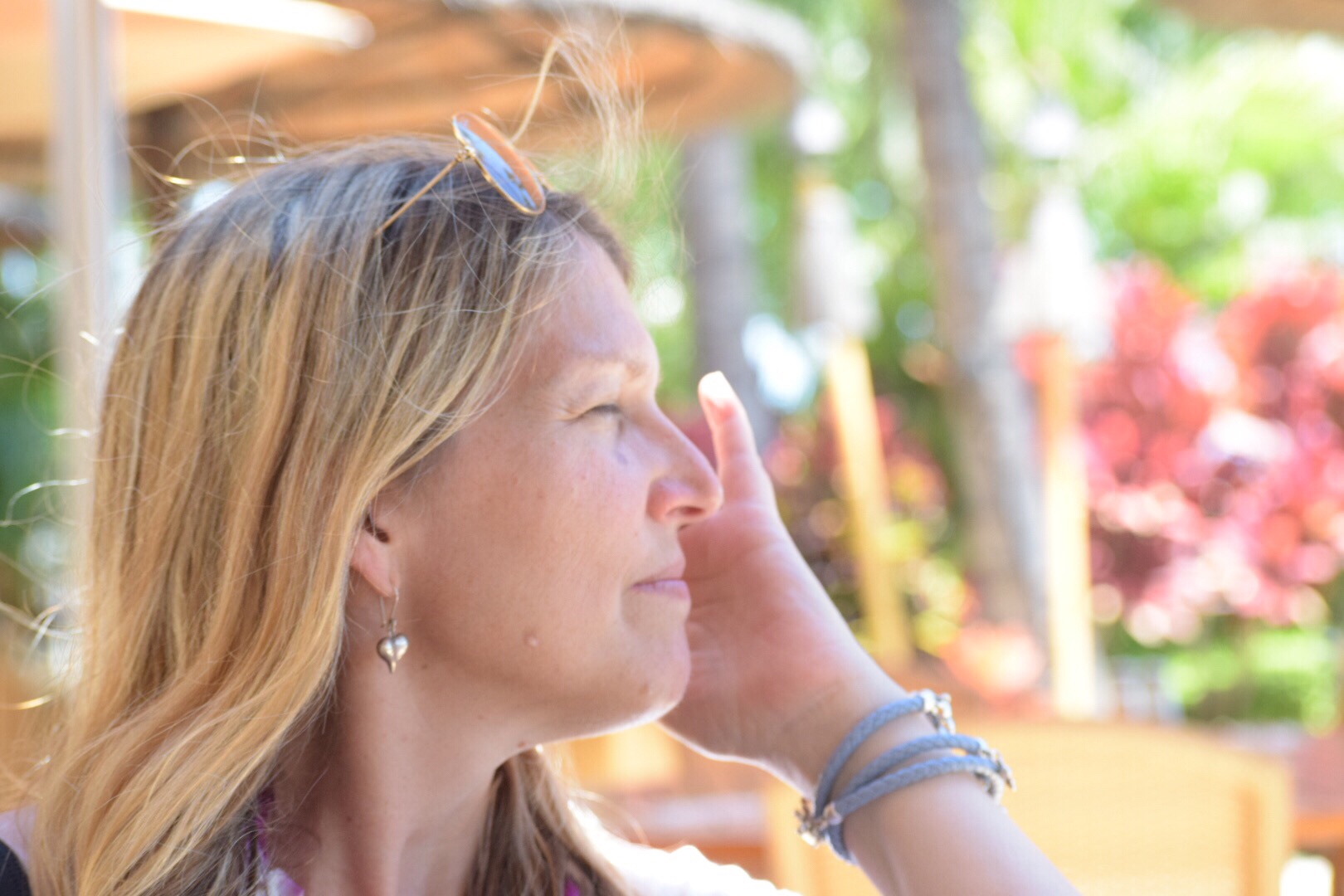 Image of author sitting  and gazing