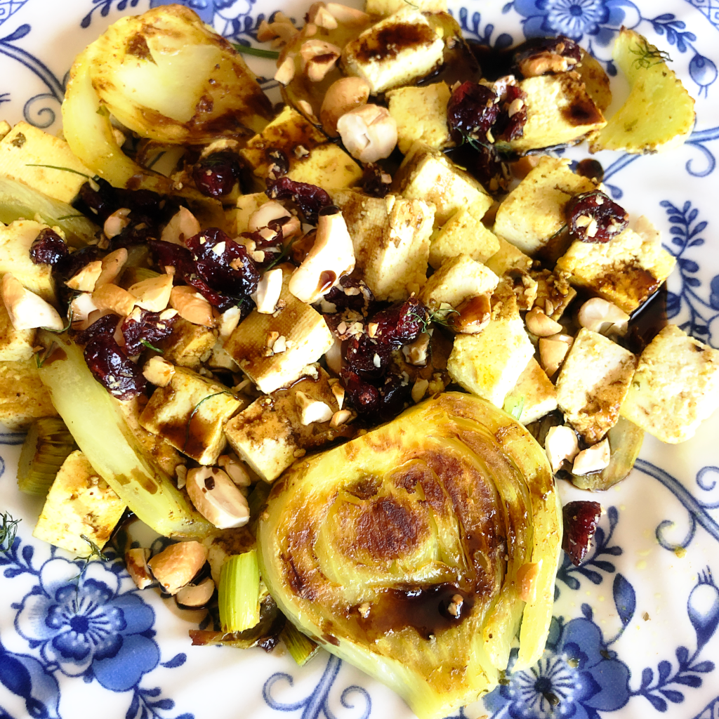 close up image of curry fennel and tofu recipe on plate