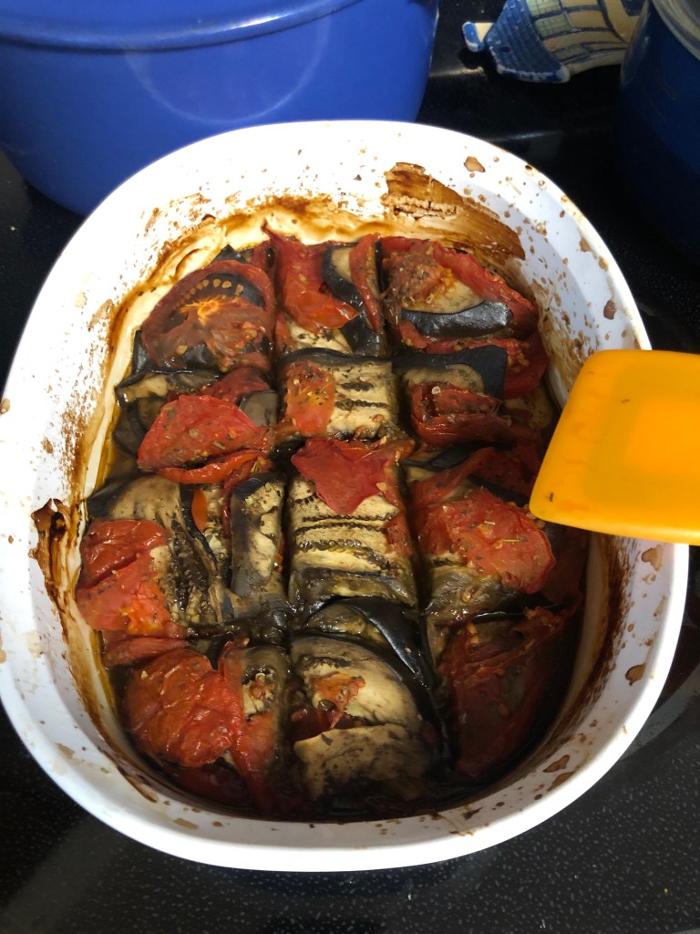 vertical image of cooked tomato eggplant casserole