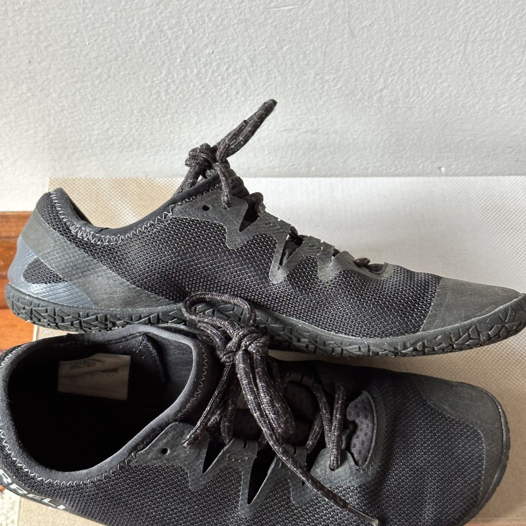 Picture of authors usual, barefoot, Merrill running shoes