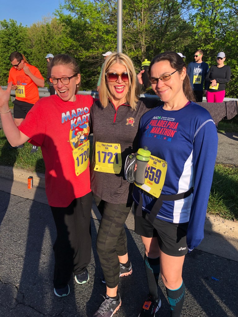 Image of author with nieces at a 10k run